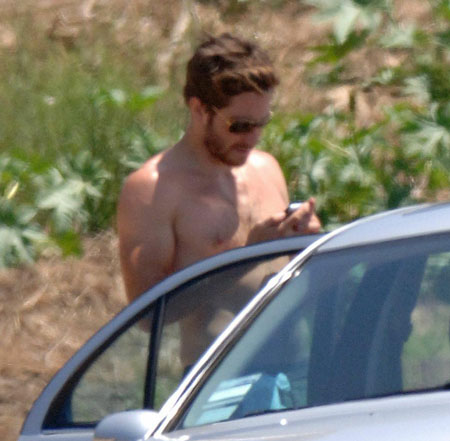 jake-shirtless-phone.jpg