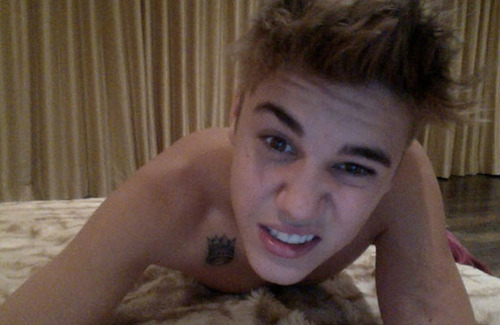 justinbiebertat-615x400.jpg