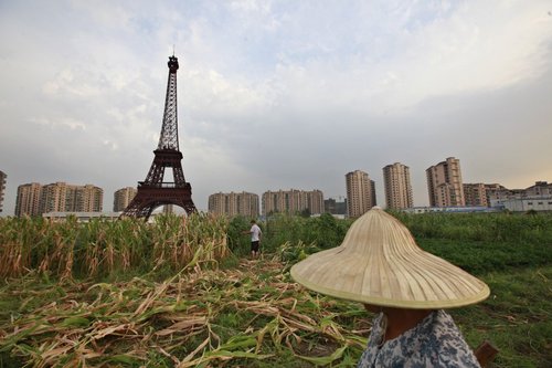 the-replica-of-the-eiffel-tower-is-108-meters-354-feet-tall-the-actual-eiffel-tower-is-3x-as-tall.jpg