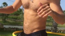 Man hula hooping no underwear