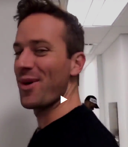 Armie Hammer peeing at urinal